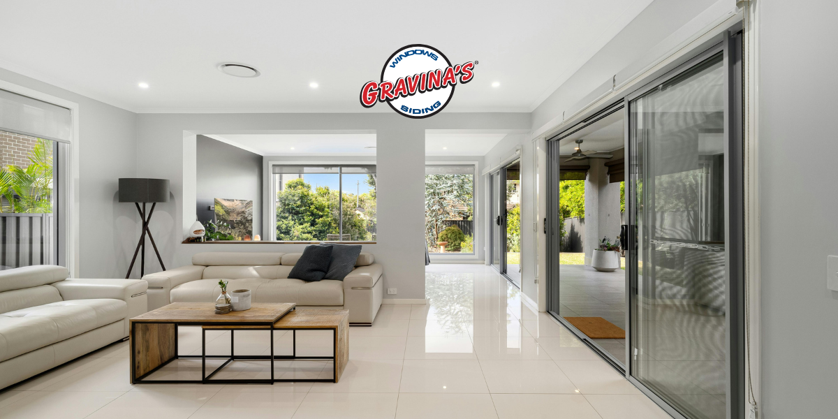 Open concept home with large panel glass patio doors.