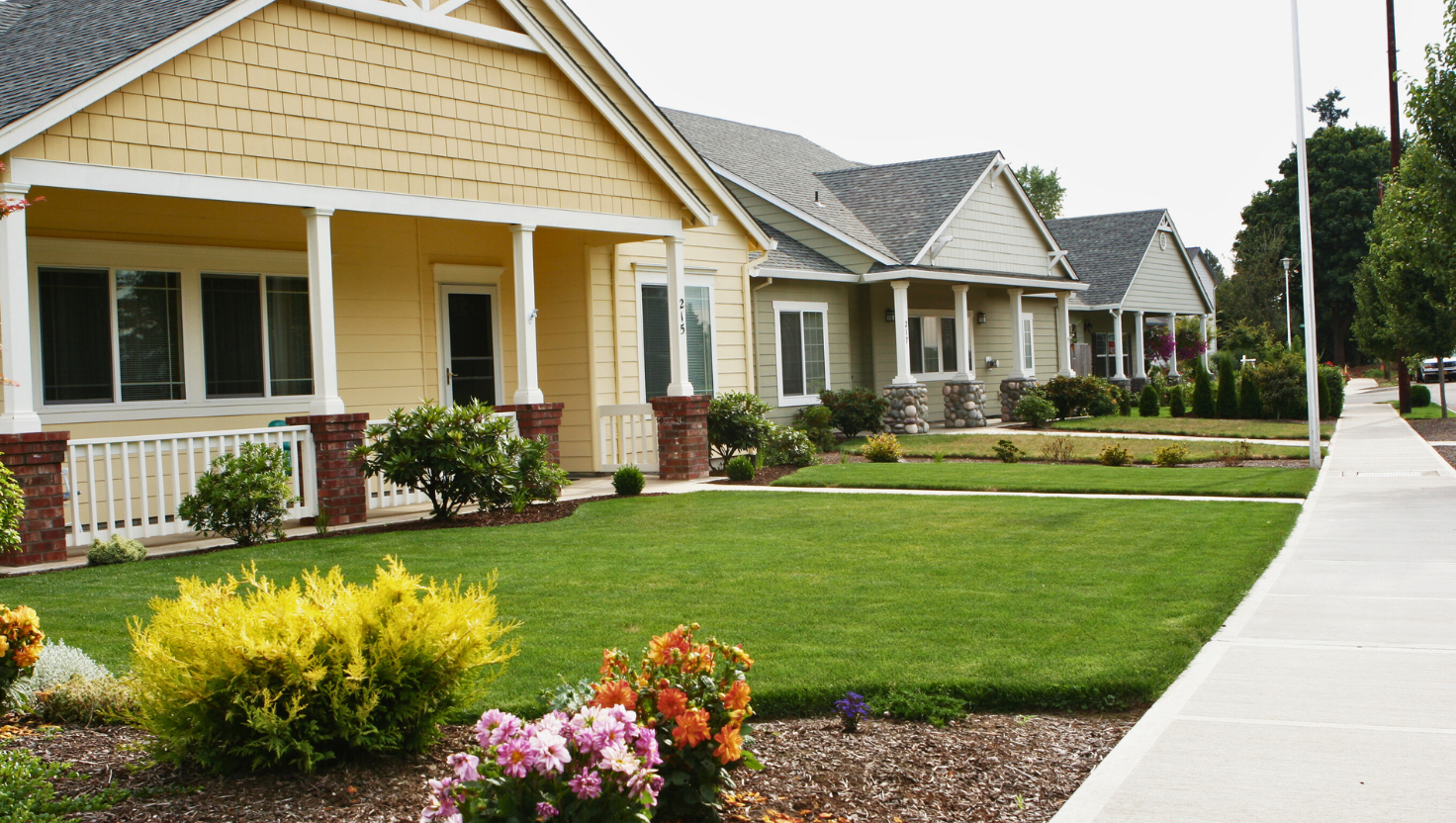 A row of houses in Colorado with neutral colored exteriors.