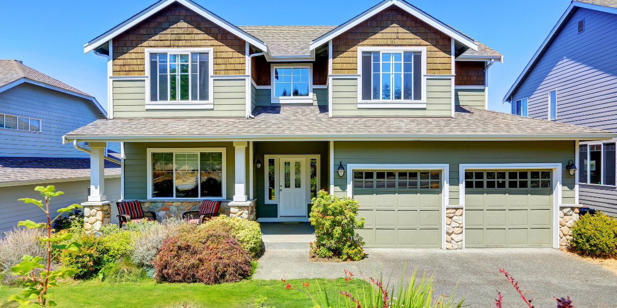 Modern family house with multiple variations of siding on the exterior